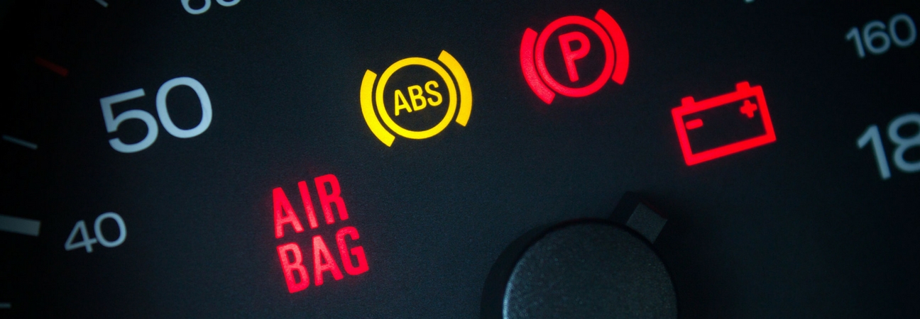 Kia dashboard lights closeup instrument panel ABS air bag parking brake indicator