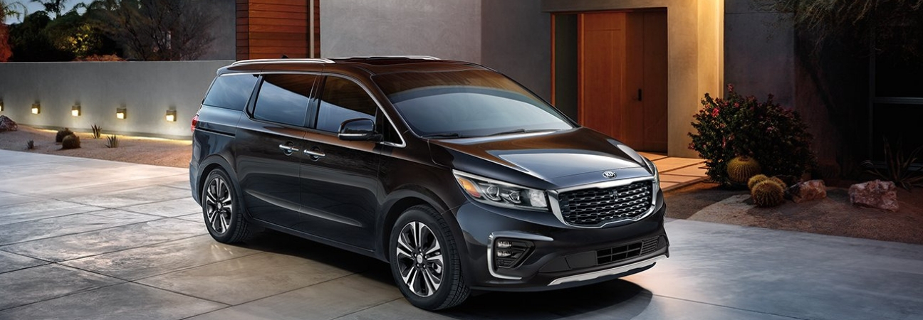 2019 Kia Sedona parked in residential driveway